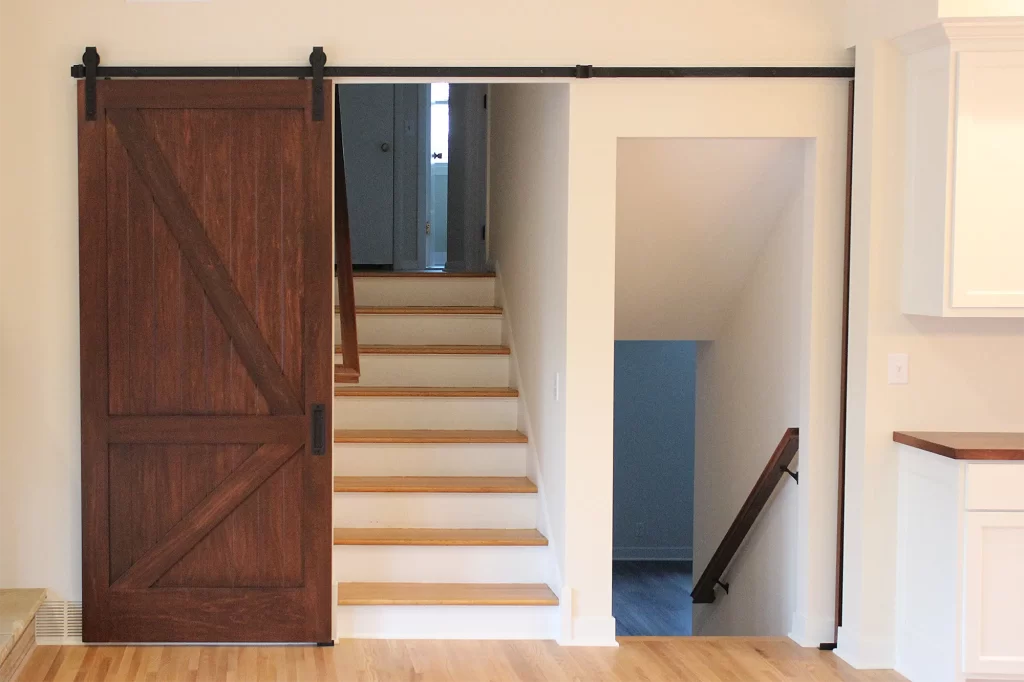 Barn doors between upper and lower level