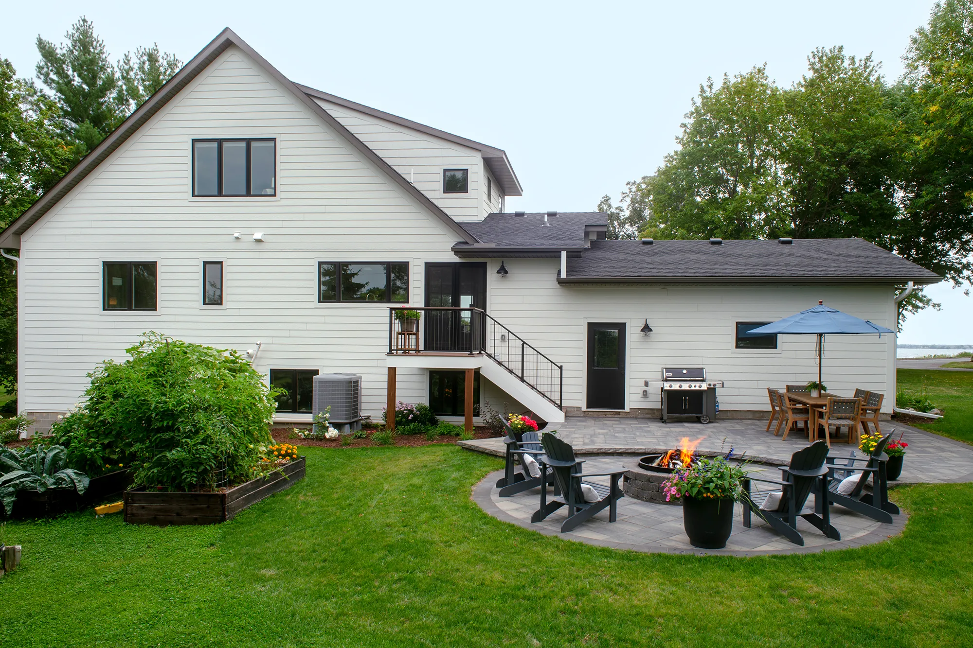 back of home with patio area